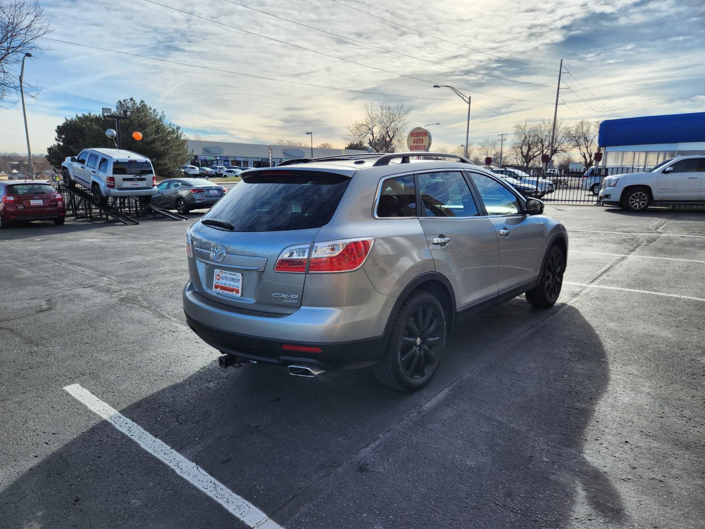 2010 Liquid Silver Metallic /Black Mazda CX-9 Grand Touring (JM3TB3MA6A0) with an 3.7L V6 DOHC 24V engine, Automatic transmission, located at 10890 W. Colfax Ave., Lakewood, CO, 80215, (303) 274-7692, 39.739914, -105.120132 - 2010 Mazda CX-9<br><br>D1 Auto NEVER charges dealer fees! All cars have clean titles and have been inspected for mechanical issues. We have financing for everyone. Good credit, bad credit, first time buyers.<br><br>Please call Lakewood Location 303-274-7692 or Thornton 303-287-5511 to schedule a tes - Photo#5
